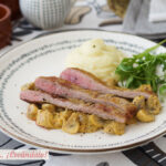 Secreto de cerdo ibérico con champiñones